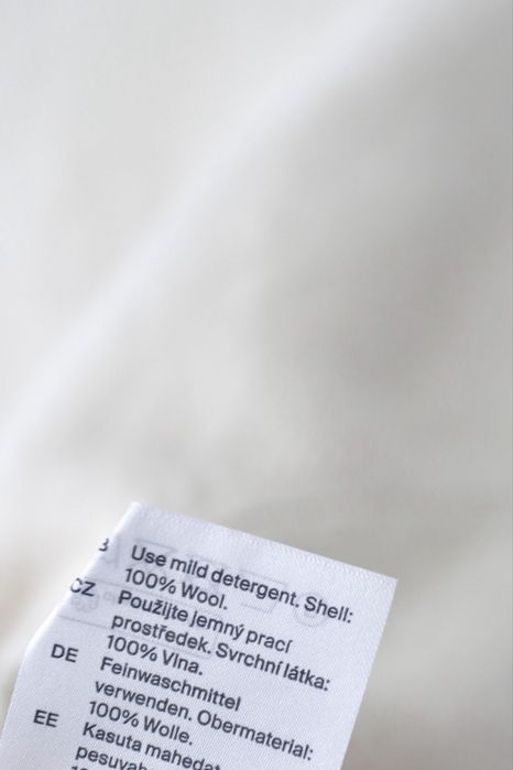 COS Wełniany sweter