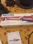 Babylise da Philips p/fazer caracois, nao queima cabelo. Nunca usado