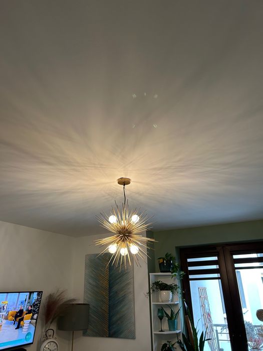 Żyrandol złoty w stylu art deco