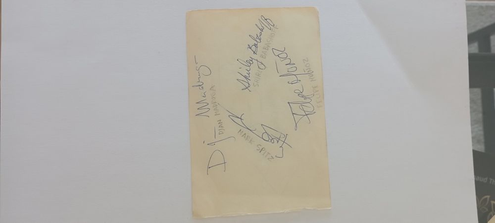 4 autógrafos de nadadores campeões