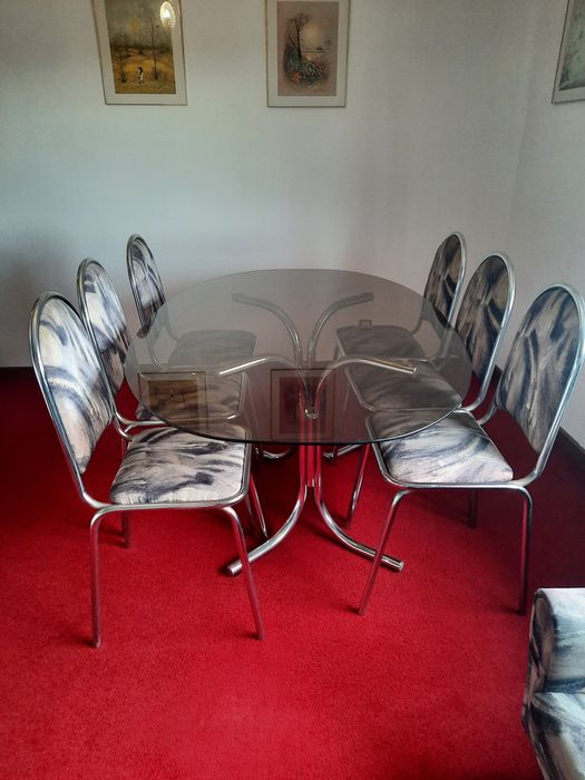 Mesa de sala de jantar em vidro oval e 6 cadeiras