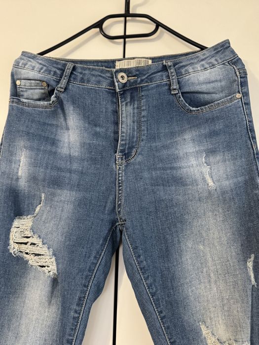 Jeansy damskie z rozdarciami rozmiar L