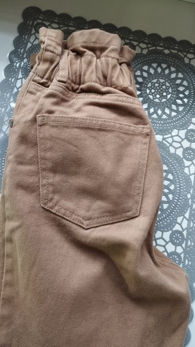 Spodnie jeansy brązowe 140 146 szerokie