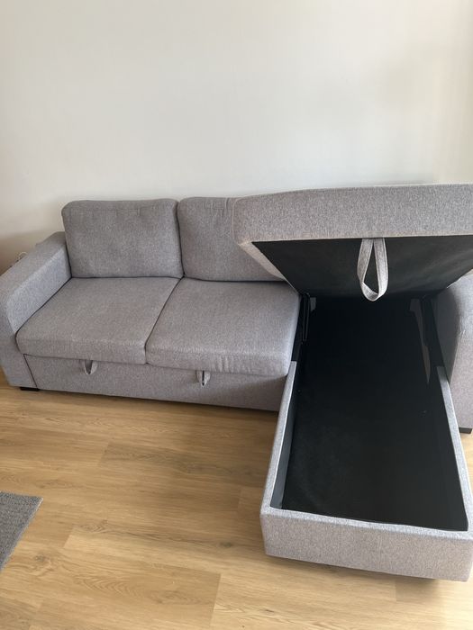 Sofá chaise-longue reversível com cama e arrumação