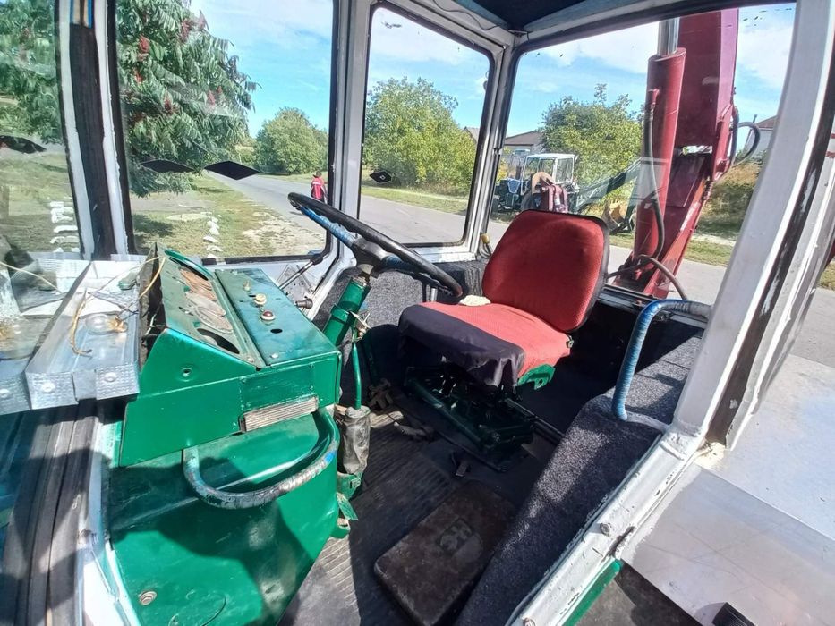 Грейферний погрузчик юмз