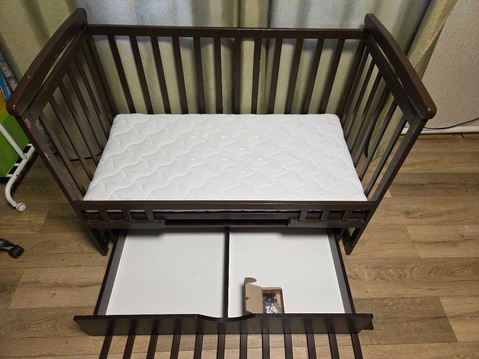 Дитяче дерев'яне ліжко трансформер