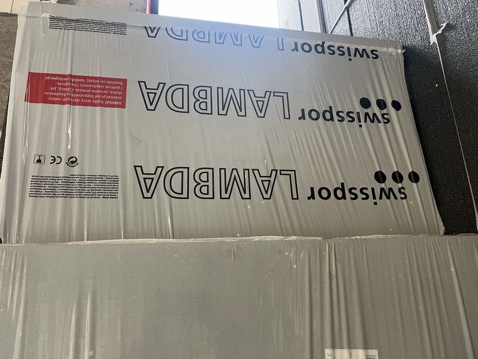 Materialy elewacyjne styropian swisspor grafit 20 tynk Caparol bialy