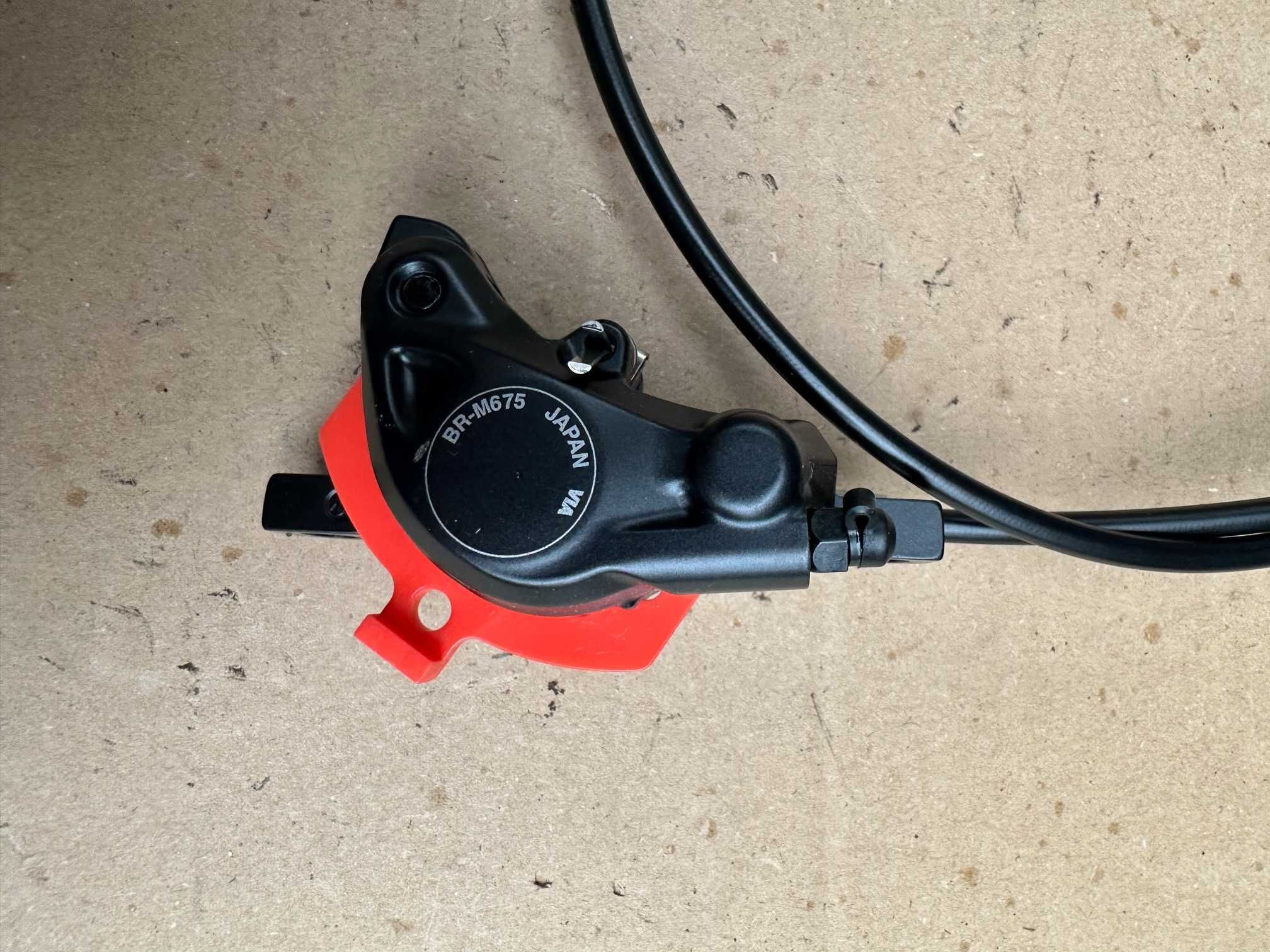 Nowy hamulec SHIMANO SLX BL-M675-B przód/lewy