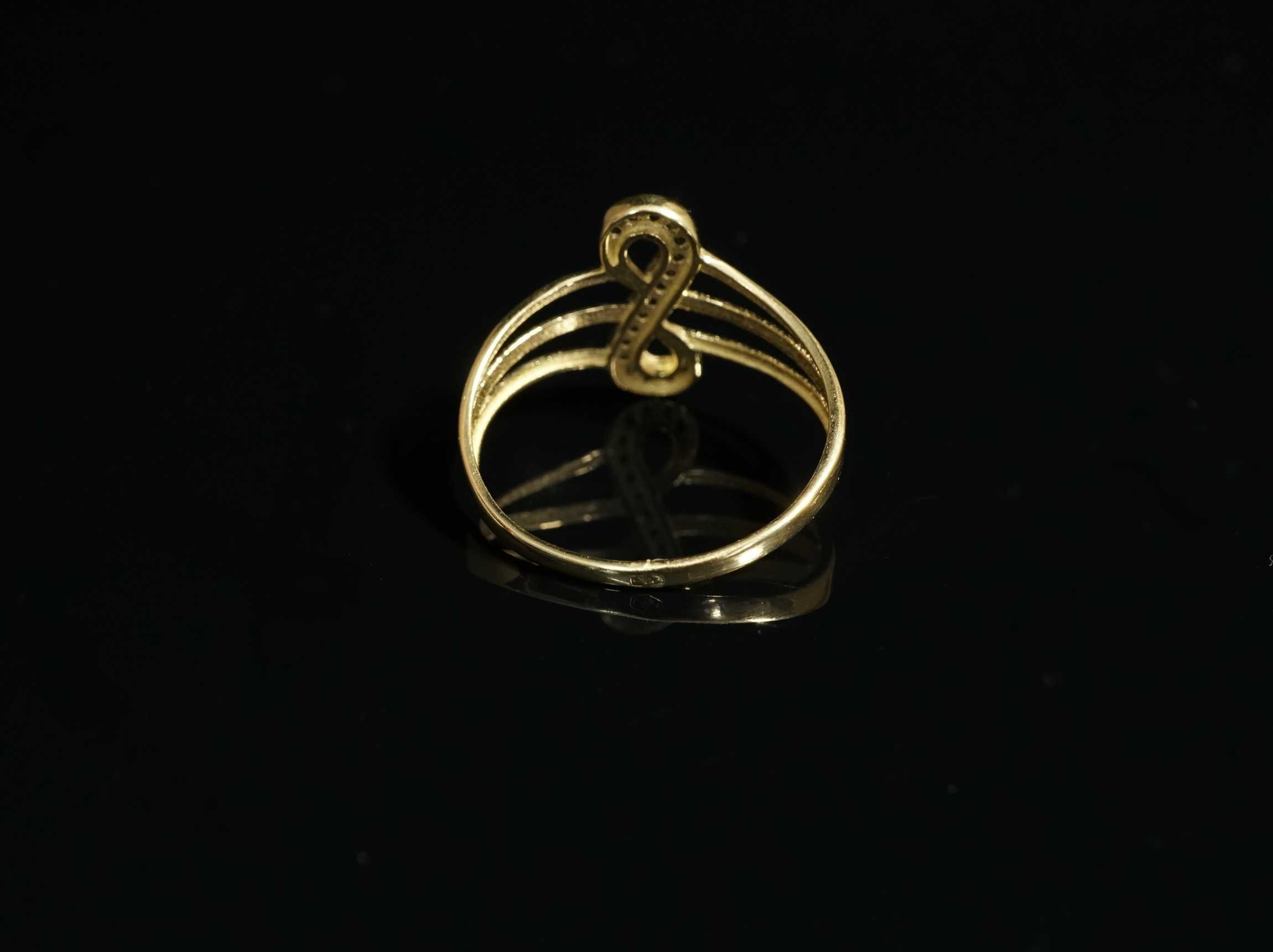Złoto 585 - złoty pierścionek znak nieskończoności rozm 18