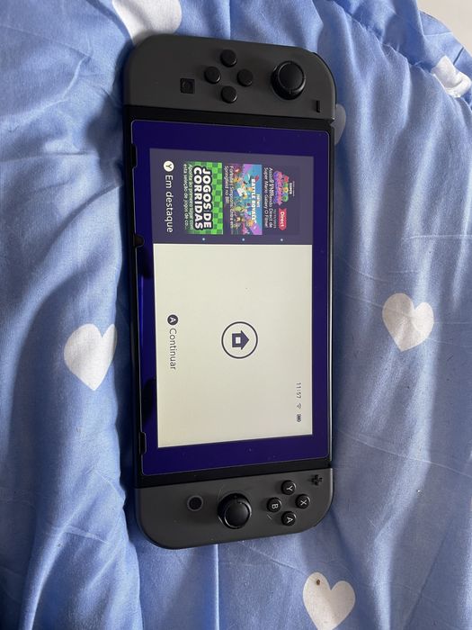 Nintendo switch v2 com 2 comandos e 2 jogos