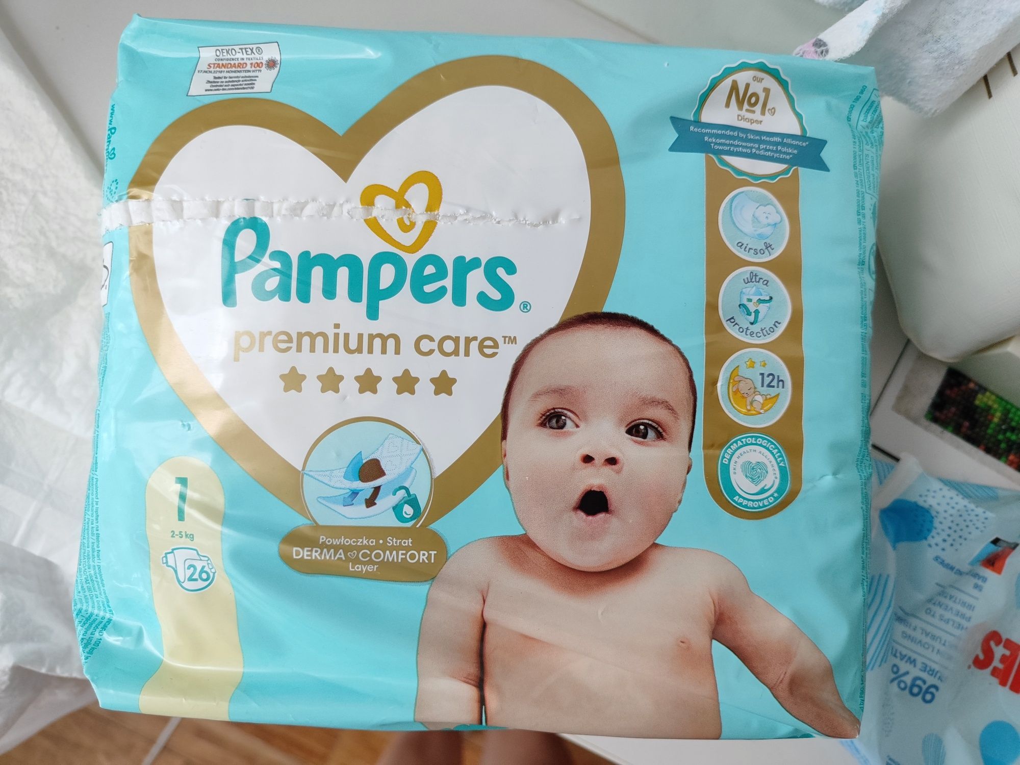 Підгузки pampers premium care