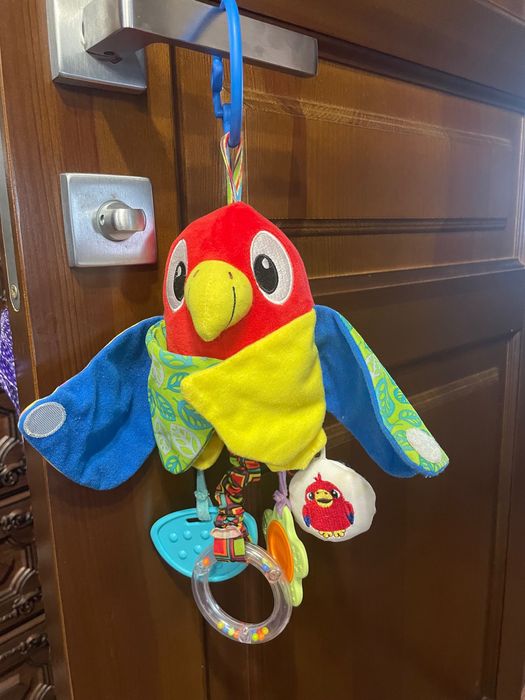 Іграшка-підвіска плюшева папуга