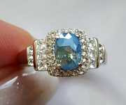Кольцо с ультраредким мадагаскарским сапфиром 1.35ct и топазами