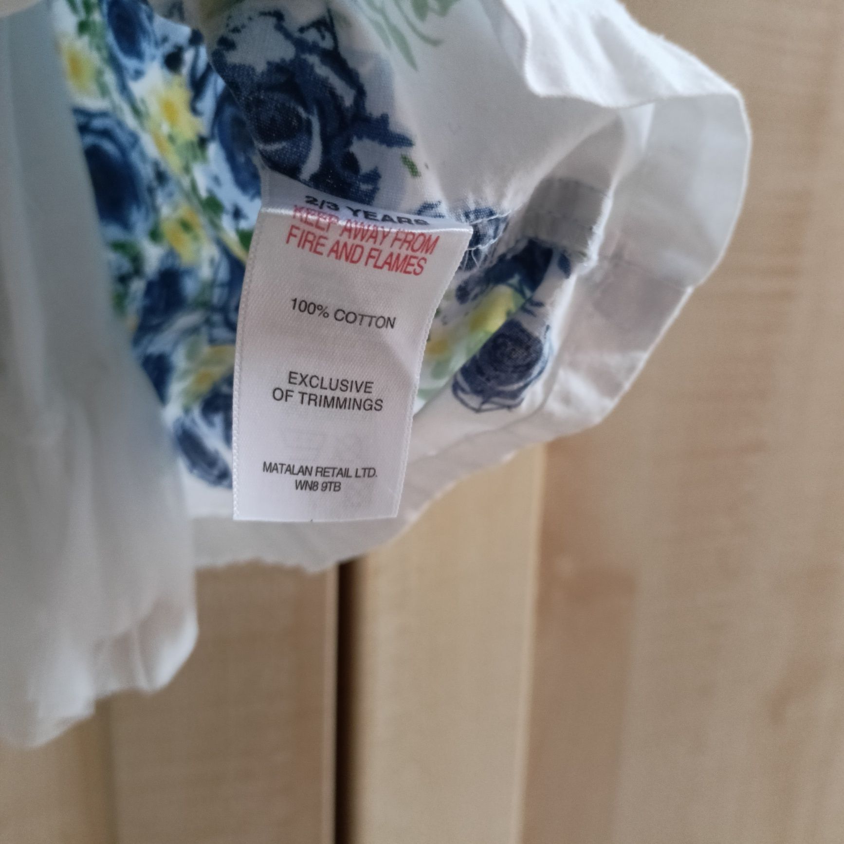 Błękitna sukienka w kwiatki  92