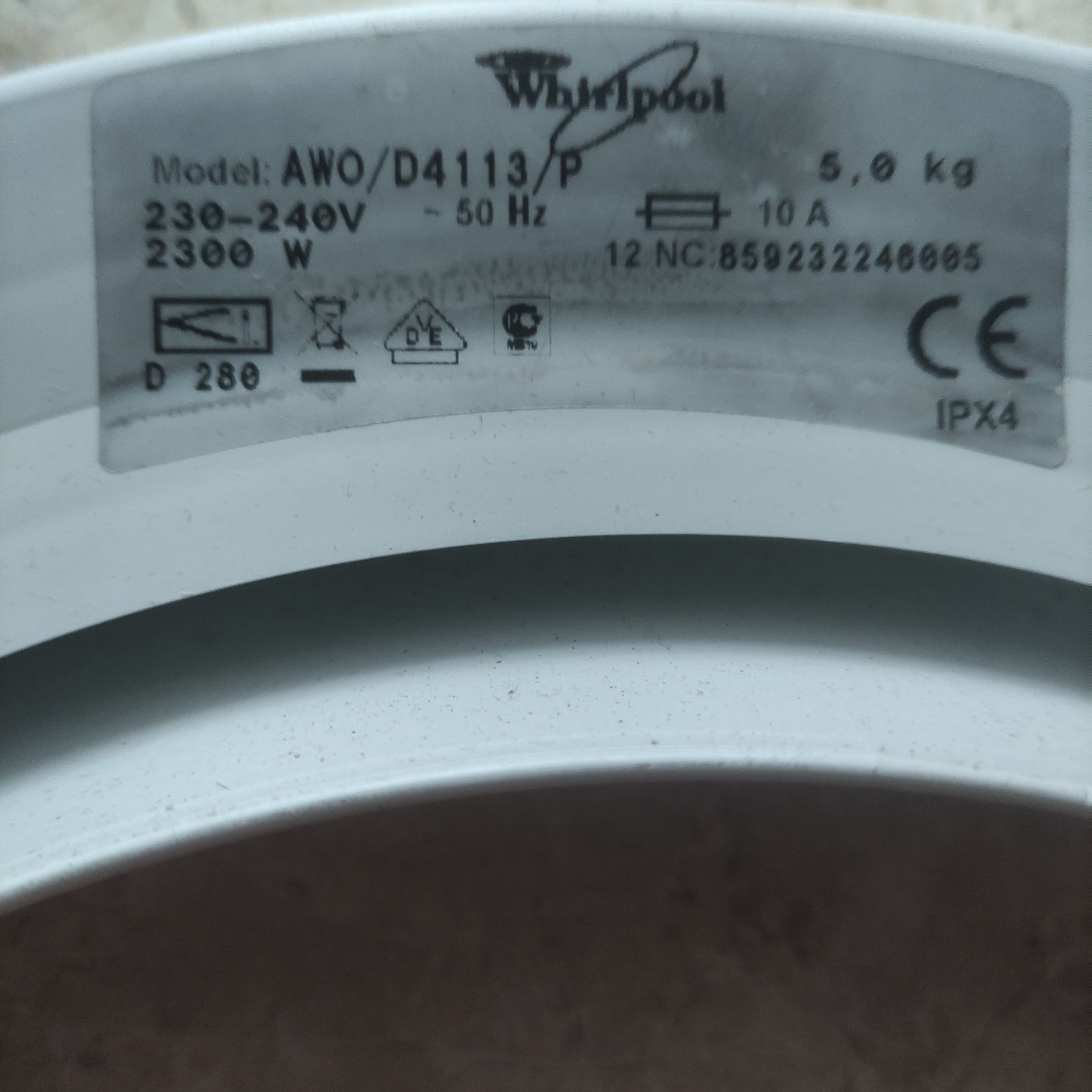 Drzwiczki do pralki Whirlpool.