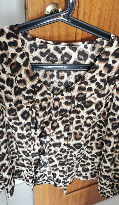 Blusa tigresa de manga comprida