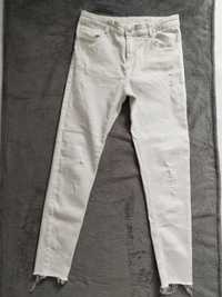 Białe spodnie 164