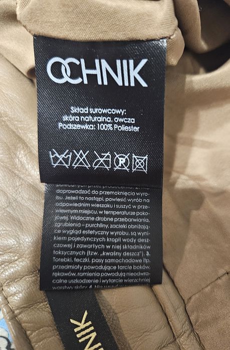 Beżowe spodnie Ochnik skórzane skóra