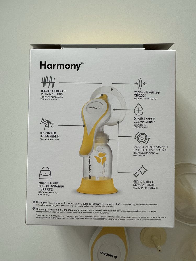 Молокосос Medela ручний + пакети для молока