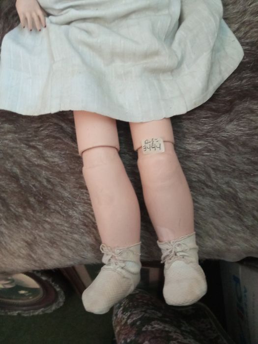 Boneca antiga em bom estado