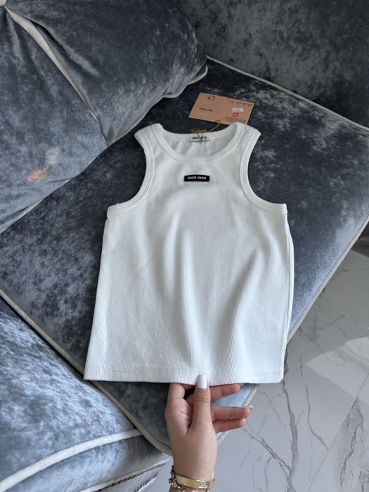 Белая майка в рубчик с дырками miu miu