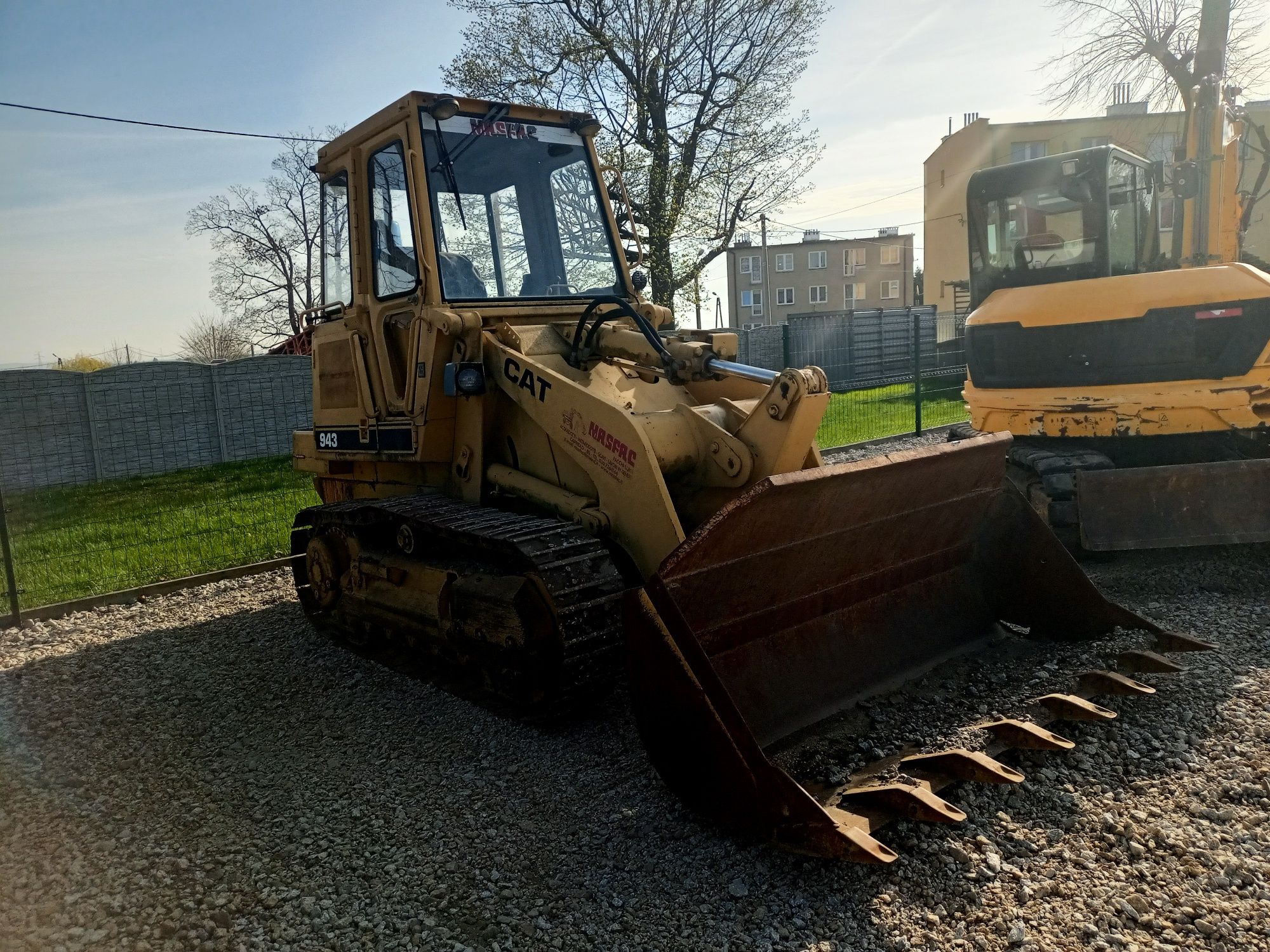 Ładowarka gąsienicowa Cat 943 Caterpillar spycharka D5 spych D3