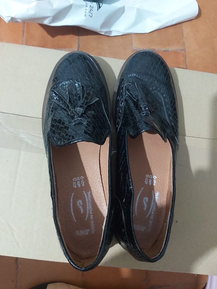 Sapatos nunca usados clássicos
