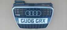 ATRAPA GRILL PODKŁADKA POD TABLICĘ AUDI A4 B7 S-LINE 8E0853651M