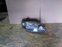 Lampa przód prawa Mazda 323F Lift