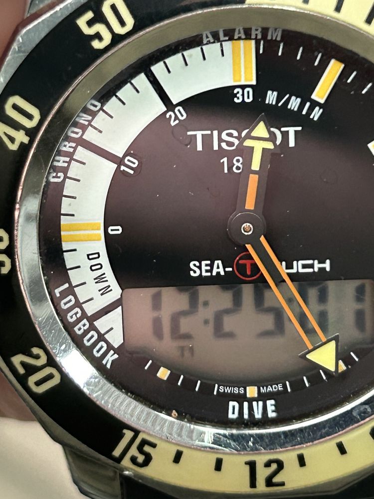 Часы Tissot sea-touch