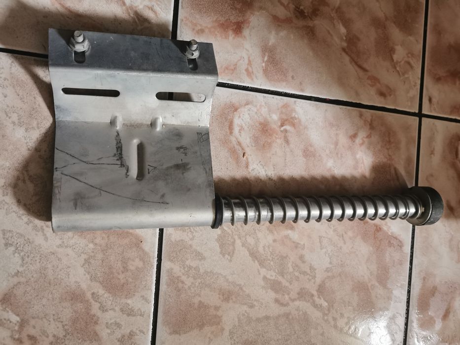 Odbojniki sprężynowe do bramy garażowej