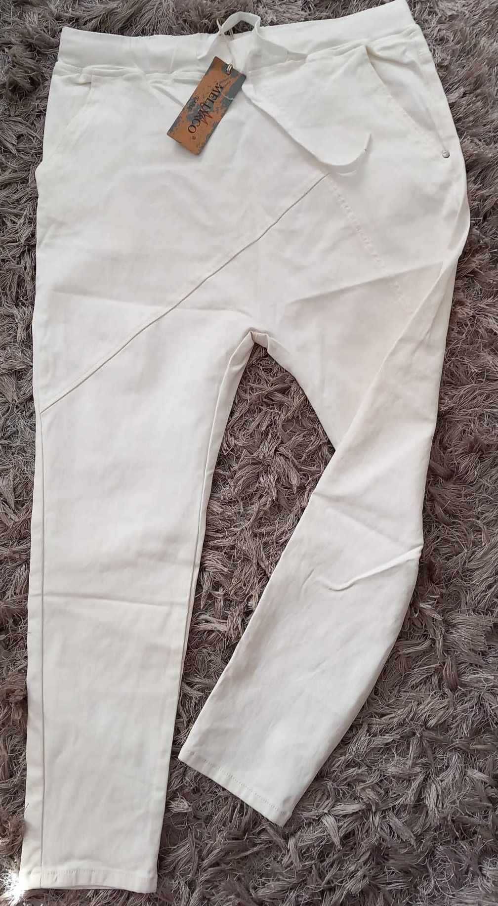 Białe spodnie eco skóra roz.40/42