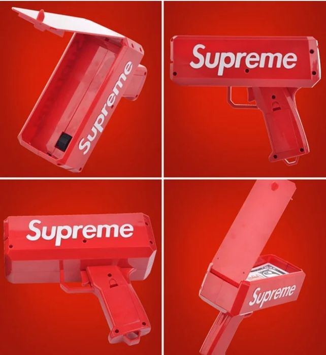 Пистолет который стреляет деньгами Money Gun