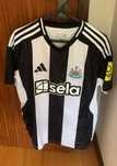 Camisola Newcastle principal