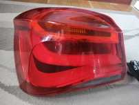 BMW F21 (po lifcie) lampa lewa tylna w błotnik, OEM, używana