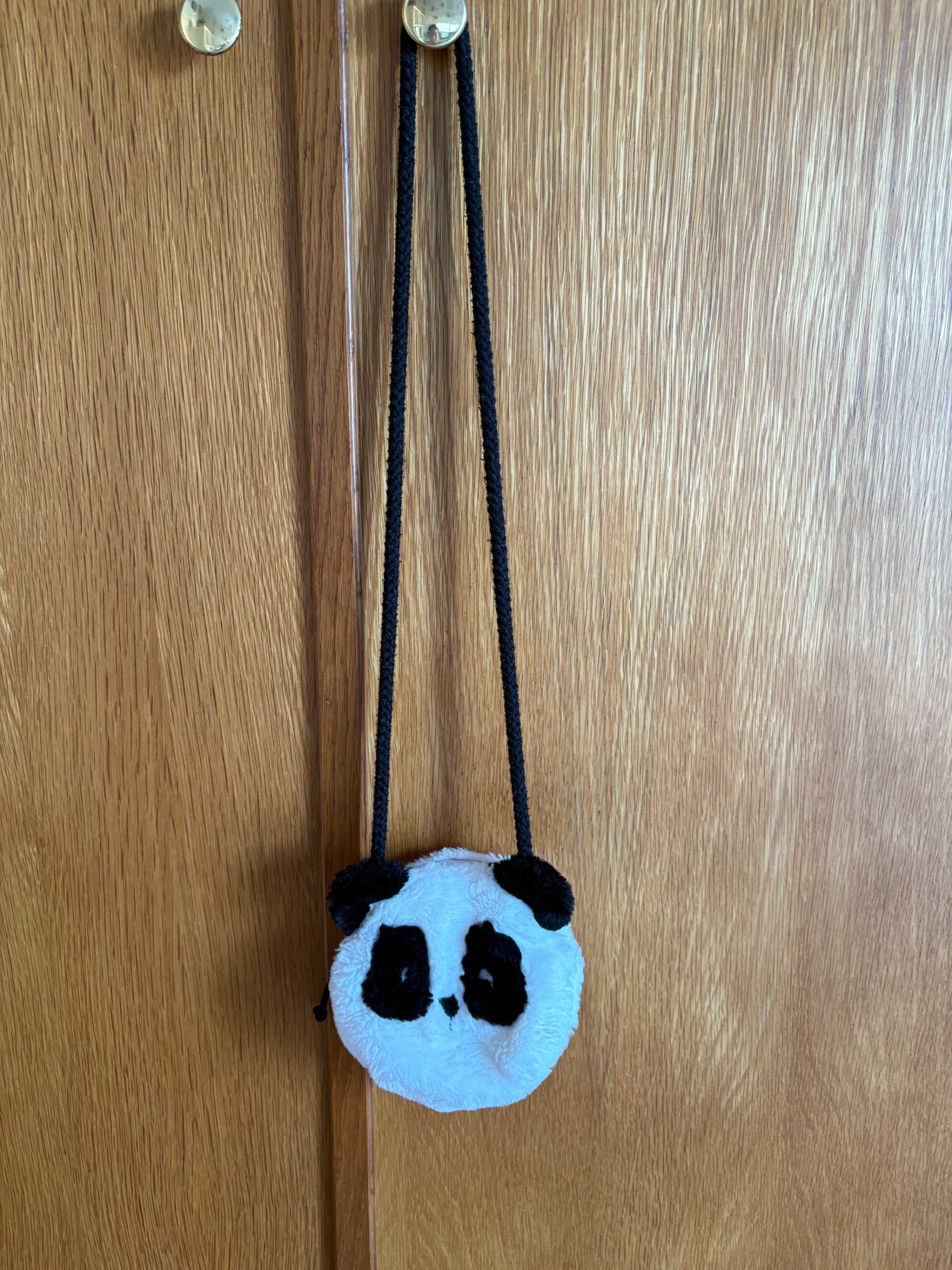 Malinha branca com padrão de panda,