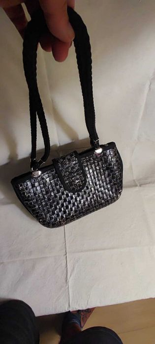 Mala de tiracolo senhora vintage, com bastante uso.