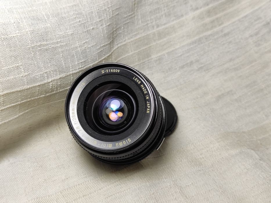 Об'єктив ширококутний Sigma 28/2.8( Olympus OM)