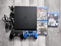 PlayStation 4 Slim 1TB + 2 pady + gry