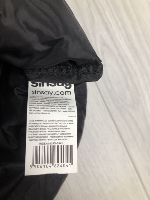 Пухова жилетка безрукавка пуховик