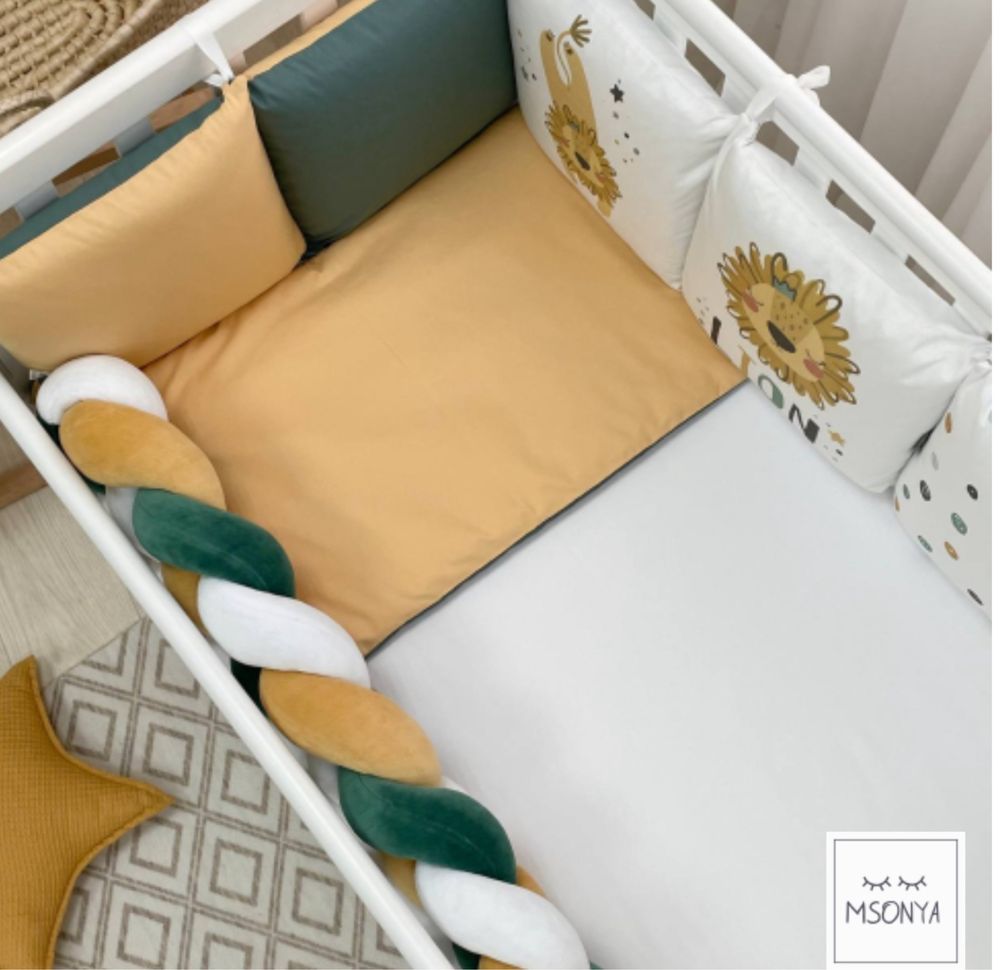 Комплект постільної білизни в  дитяче ліжечко