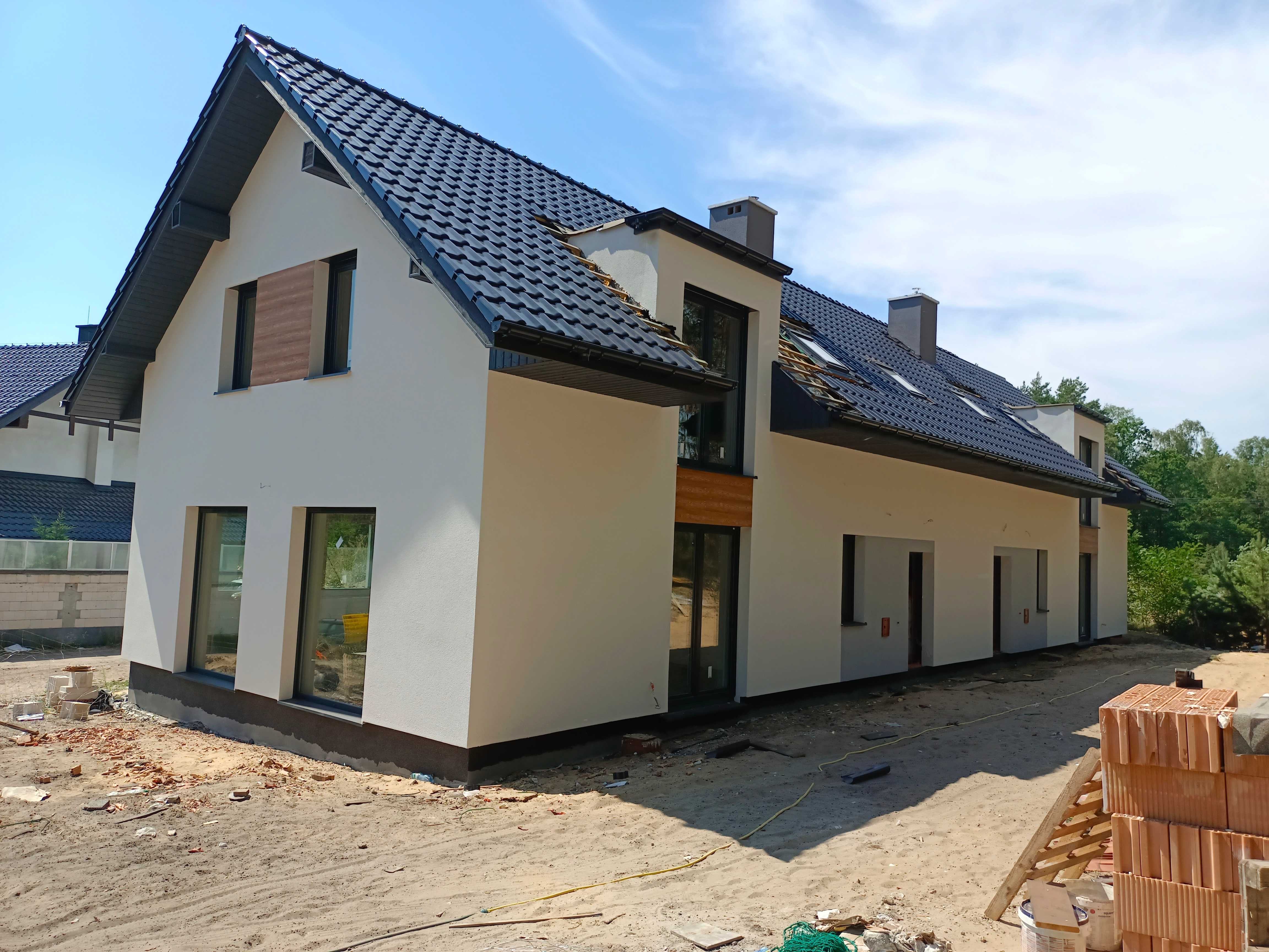 Ocieplenia domów,Docieplenia domów,Elewacje domów,Montaz podbitki