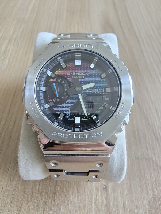 CASIO GM-2100RW-1AER G-SHOCK gwarancji na metalowej bransolecie.