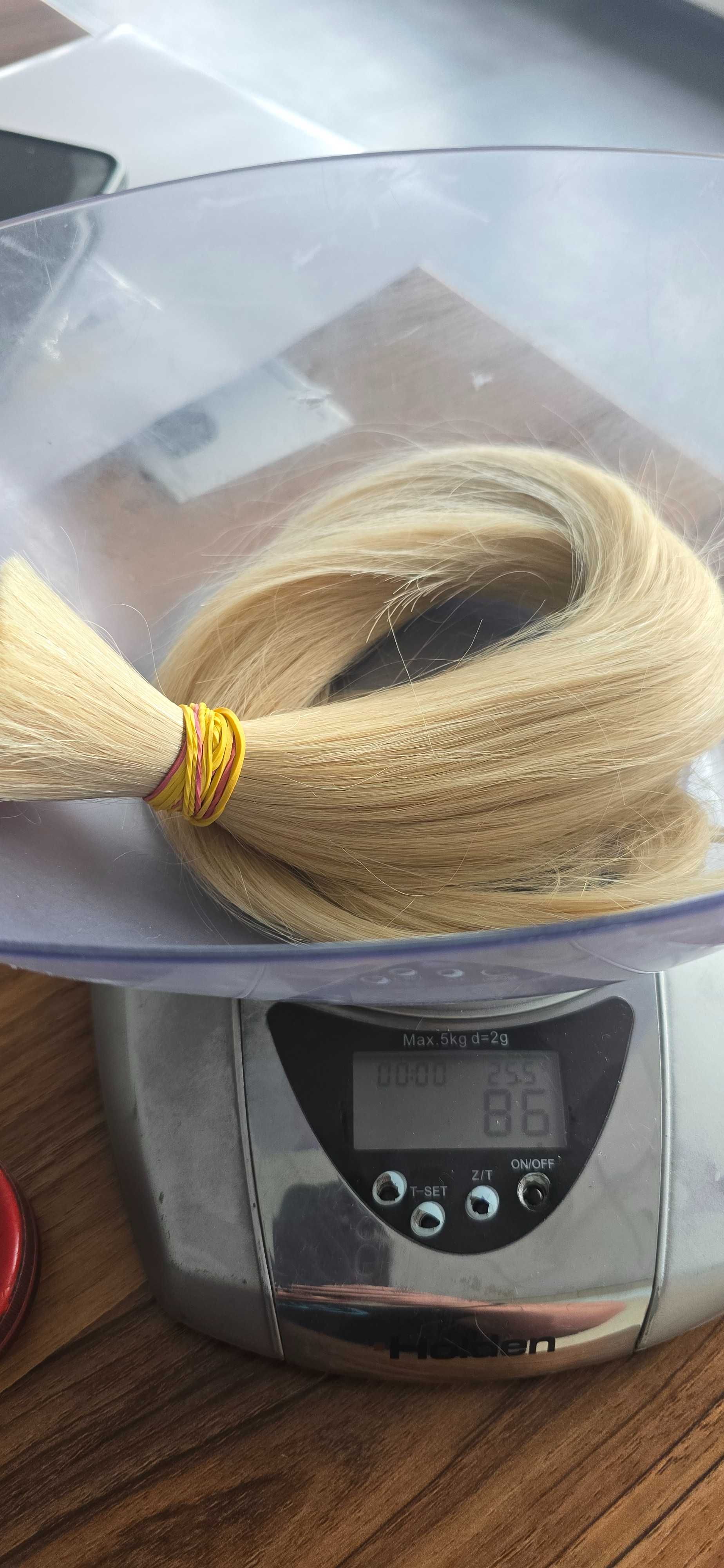 Włosy naturalne bardzo jasny blond 57cm waga 86 gram.