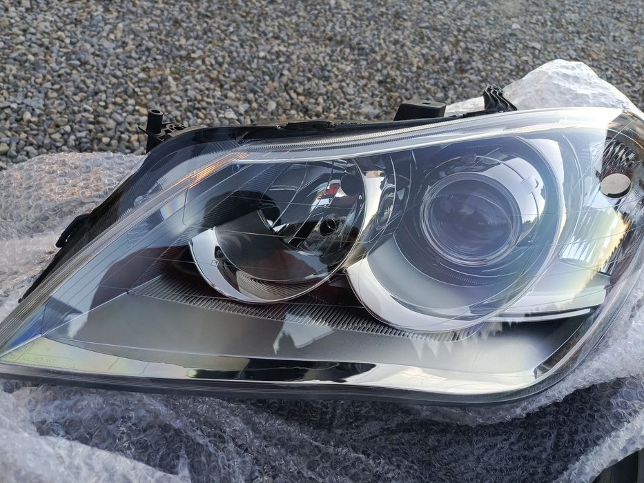 Reflektor Suzuki kizashi lewy nowy elektrycz. Reg.