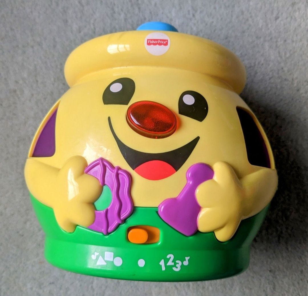 Garnuszek na klocuszek Fisher Price śpiewa po angielsku