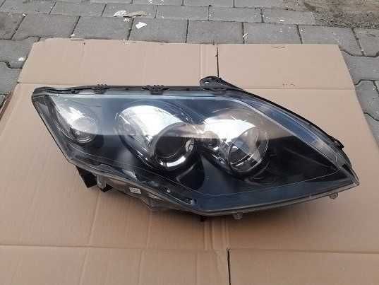 reflektor lampa renault laguna III 3 prawy oryginał europa cały