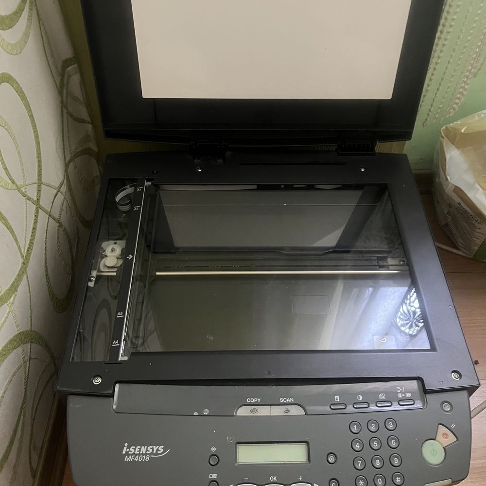 Принтер -сканер Canon i-sensys MF4018