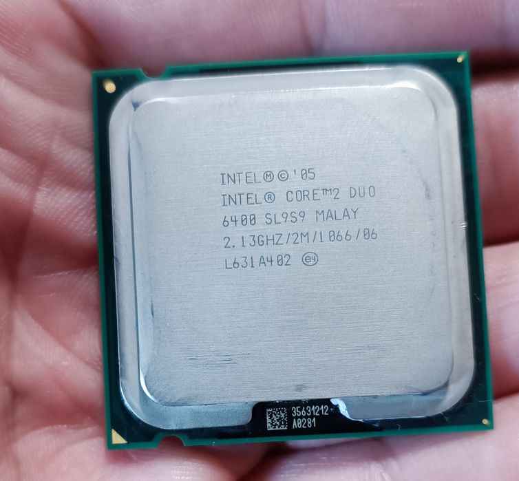 Відеокарта Sapphire 128Mb,Процесор 
Intel core 2