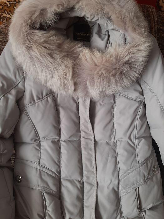 Классный пуховикl б/у 48-50разм.